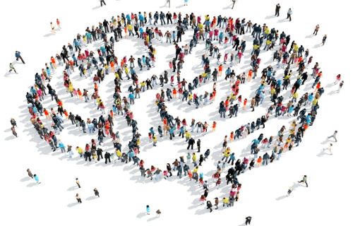 Immagine di persone in gruppo che formano la silhouette di cervello umano